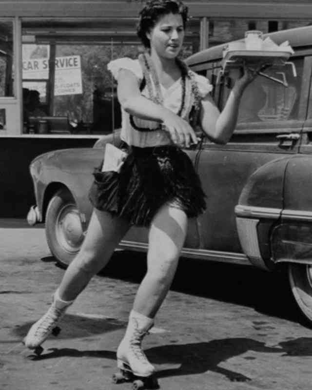 Roller skating carhop in the 1950s.