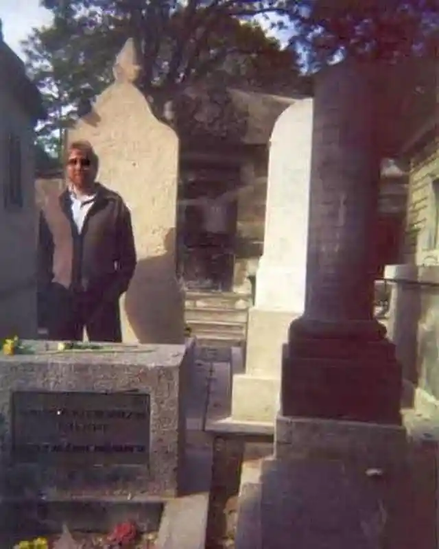 In 1997, Tom Petty took this picture at Jim Morrison's grave site, which shows Jim's ghostly image in the background.