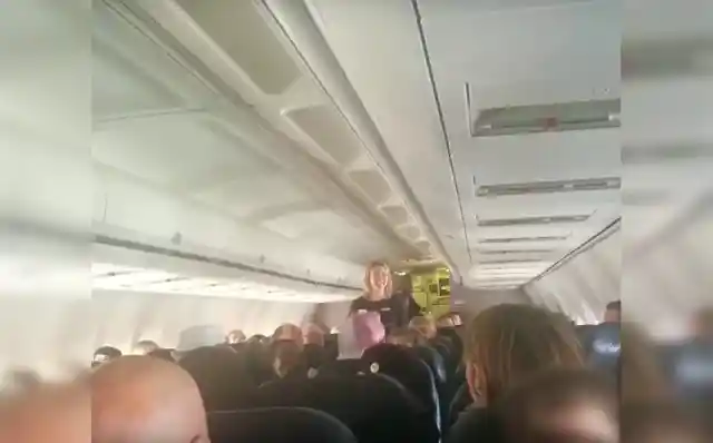 When This Flight Attendant Heard A Strange Voice On The Intercom She Rushed To The Front Of The Plane