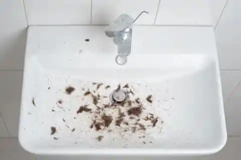 16. Beard Trimmings in the Sink