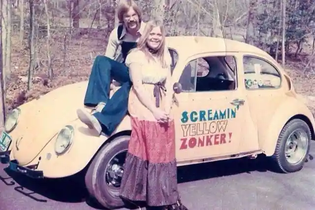 A couple with their hot rod VW in 1970.