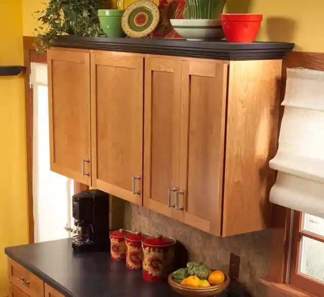 30. Add Shelving and Crown Molding to Your Upper Cabinets