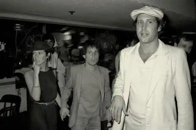 Carrie Fisher, Paul Simon and Chevy Chase at the Caddyshack premiere, 1980.