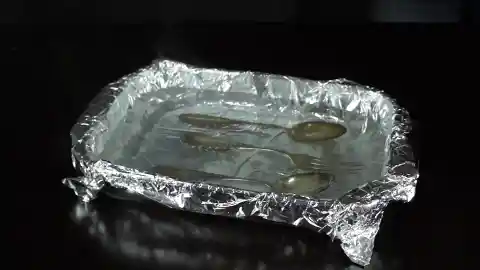 Removing Tarnish from Cutlery using Aluminum Foil